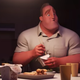 The Parr family sits down to dinner in a still from The Incredibles 2.